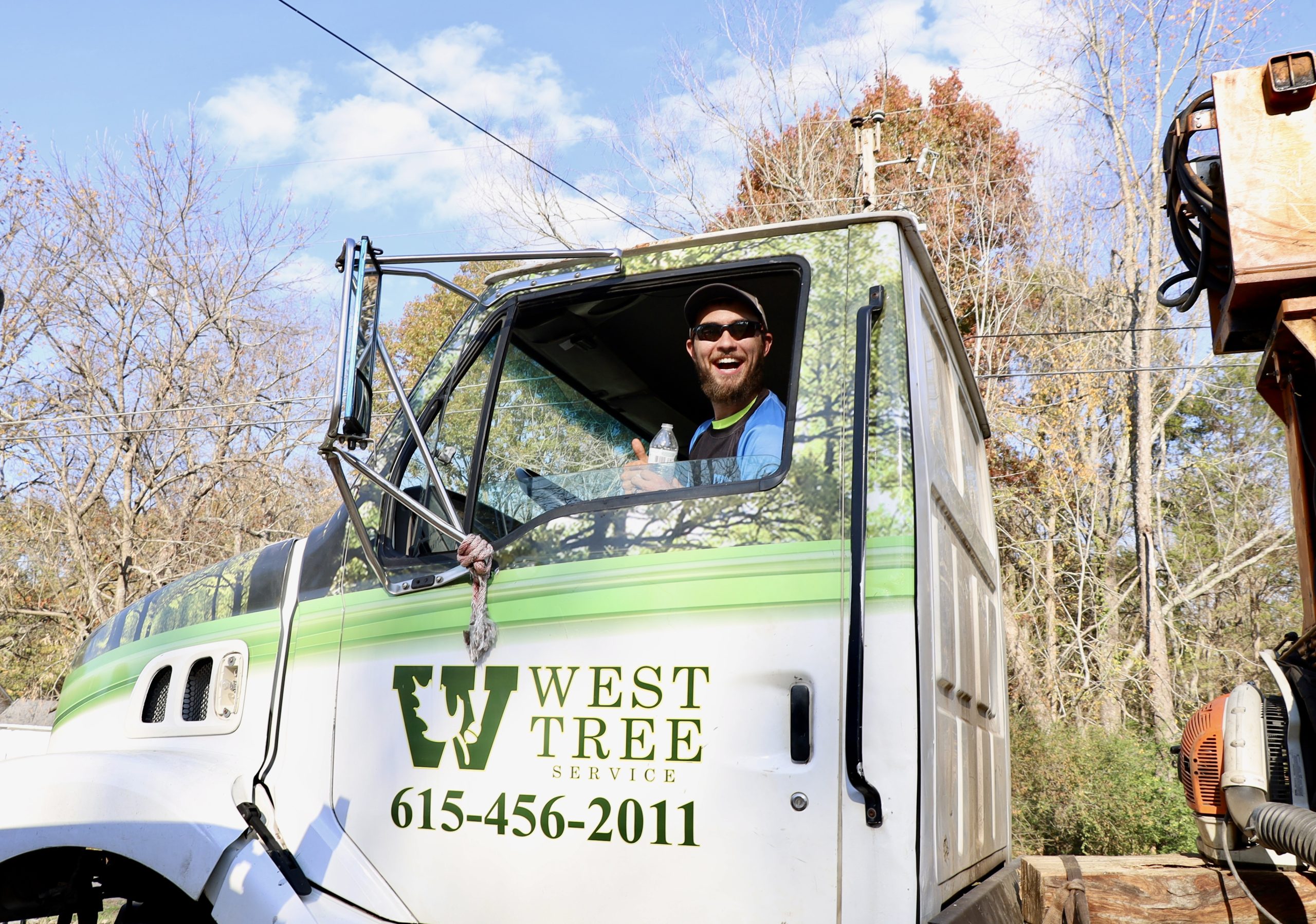 West Tree Service branded truck
